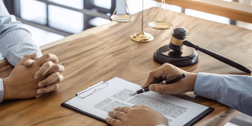 Lawyer reviewing contract with the client