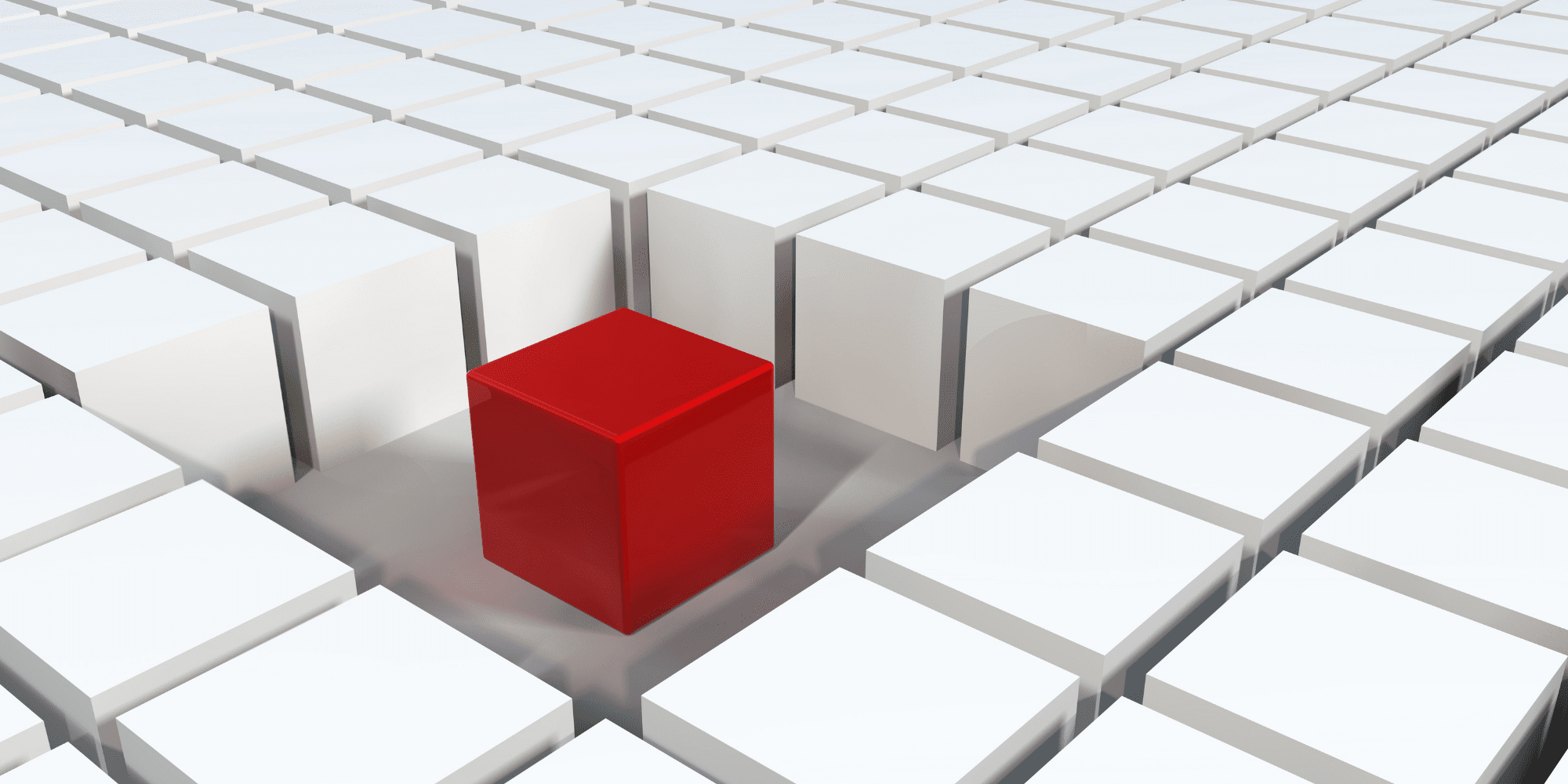 one red cube amongst lots of white cubes