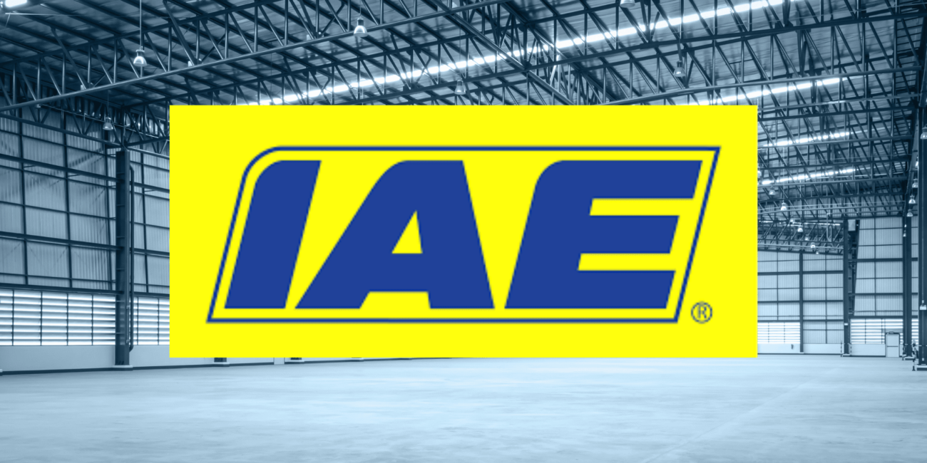 Empty warehouse with the IAE logo on