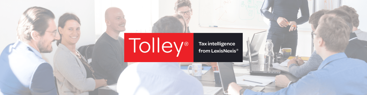 A team meeting with the Tolley logo