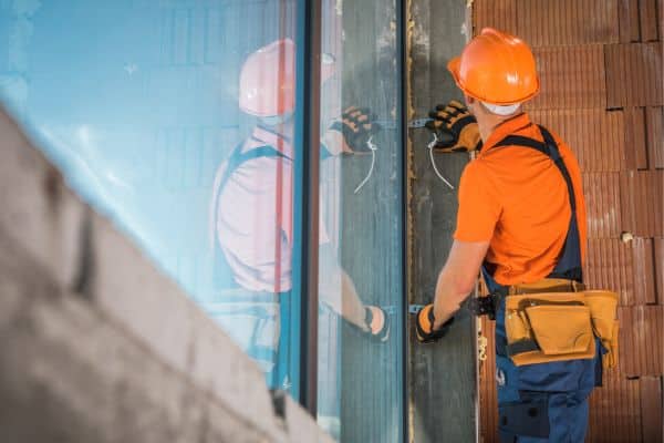Builder renovating a building