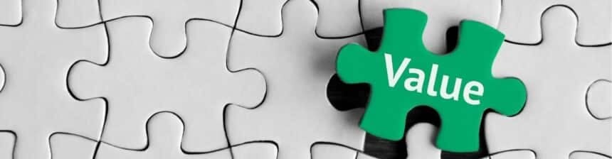 Puzzle with a piece added that says 'value' on it
