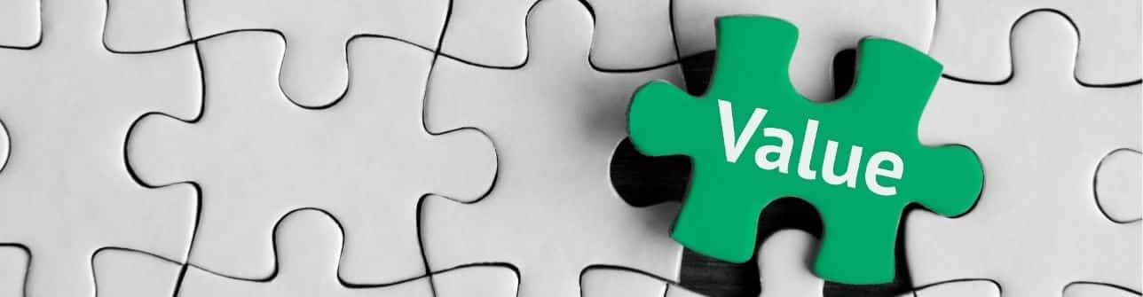 Puzzle with a piece added that says 'value' on it