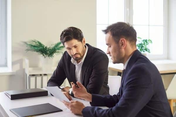 A client meeting with their solicitor